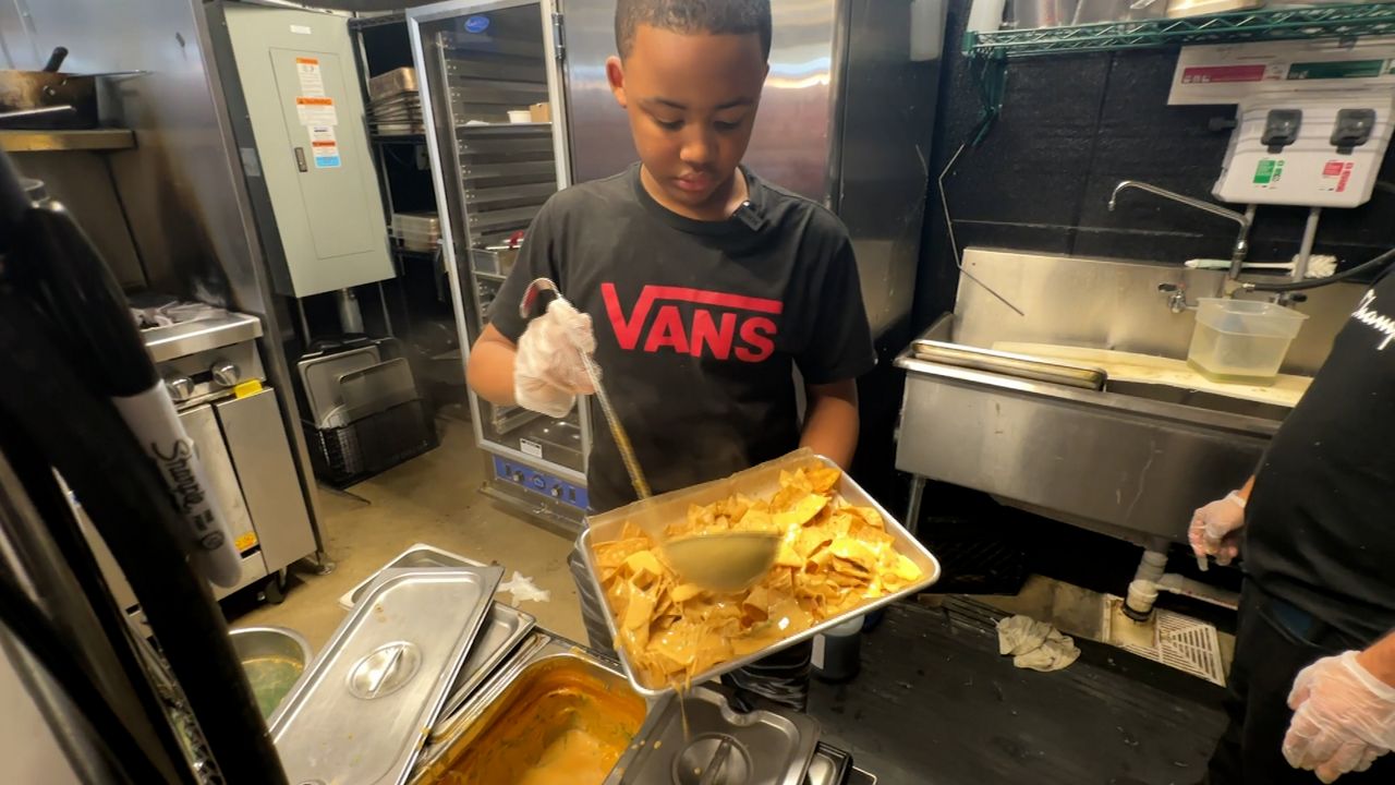 Father, son bond over family business