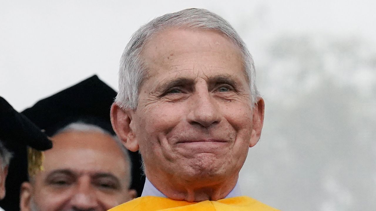 Anthony S. Fauci, MD, recently retired director of the National Institute of Allergy and Infectious Diseases of the National Institutes of Health, shows his appreciation to clapping students after receiving his honorary degree at Washington University during graduation ceremonies in St. Louis on Monday, May 15, 2023. (Photo Credit: Bill Greenblatt/UPI)