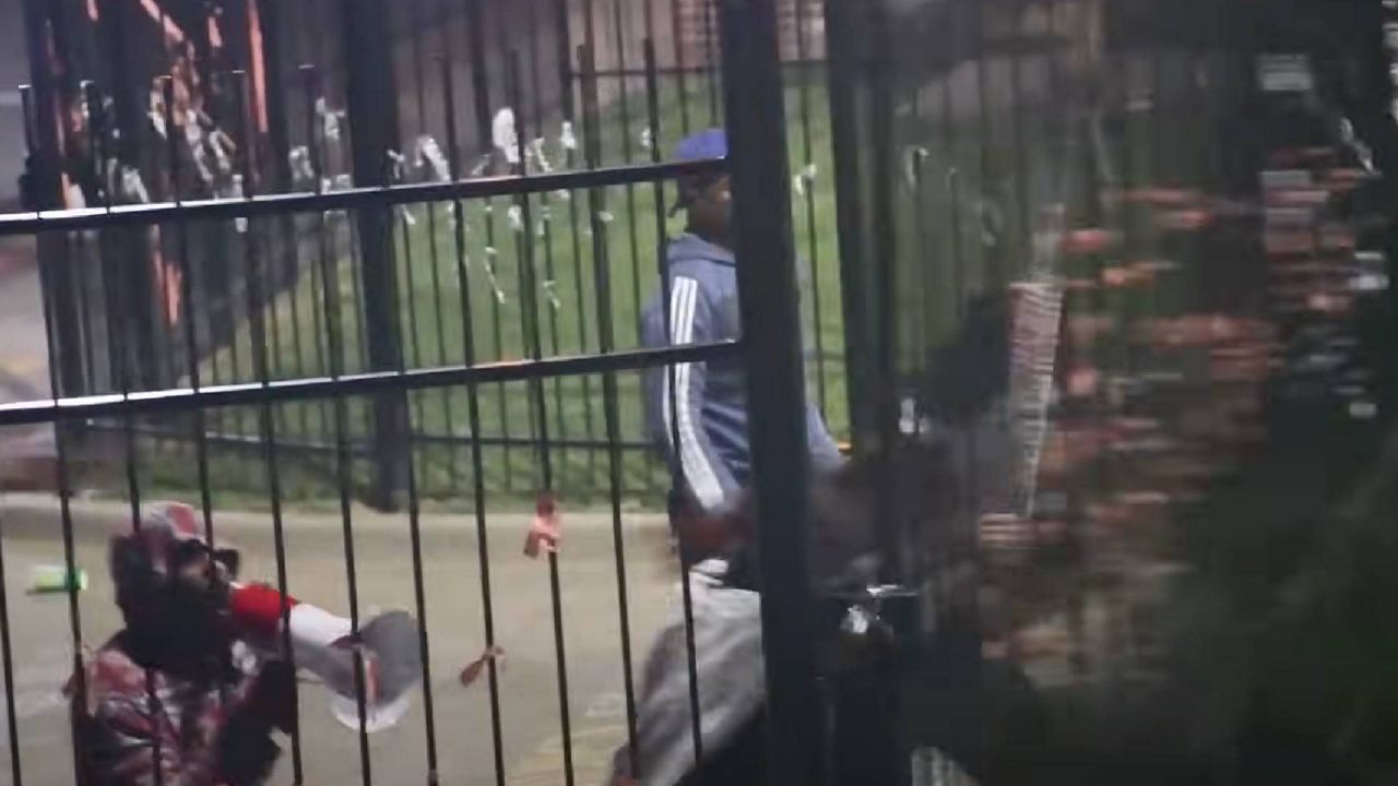 Police surveillance footage captured images of protesters damaging fencing outside the Ferguson Police Department on Friday. (Courtesy: Ferguson Police Dept.)