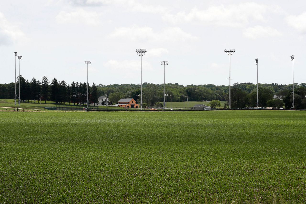 LEADING OFF 'Field of Dreams' game grows in Iowa cornfield