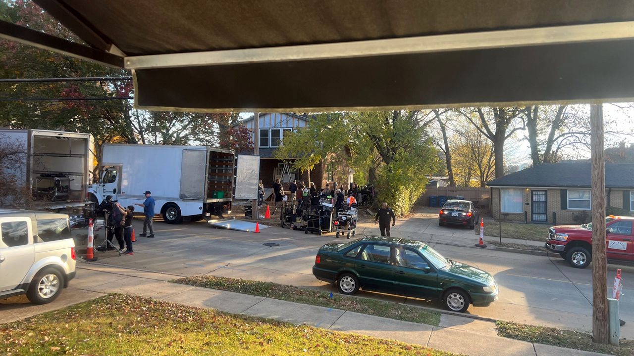 Trucks and equipment can be seen in front of a house on Bellevue Road across Spencer Marquart’s home in Maplewood Monday morning. This was one of the filming spots for a Hollywood movie called "On Fire," which will tell  St. Louis native John O'Leary's story. (Photo Credit: Spencer Marquart)