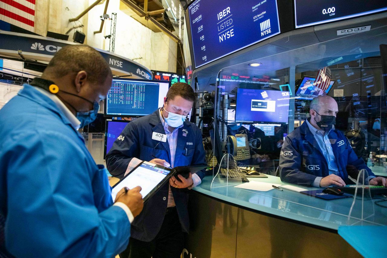 Asian shares sink, Tokyo down 4% after tech rout on Wall St