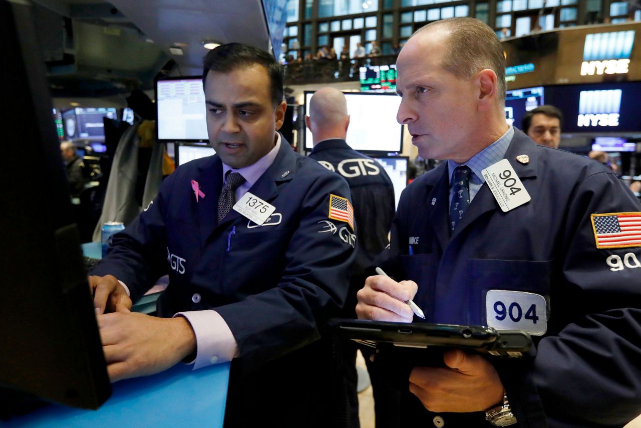 Wall Street opens higher following signal that labor market is cooling