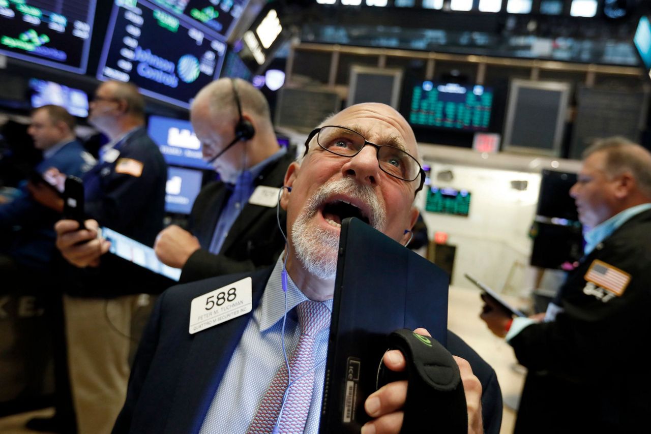 Stocks move broadly higher as turbulent week nears its end