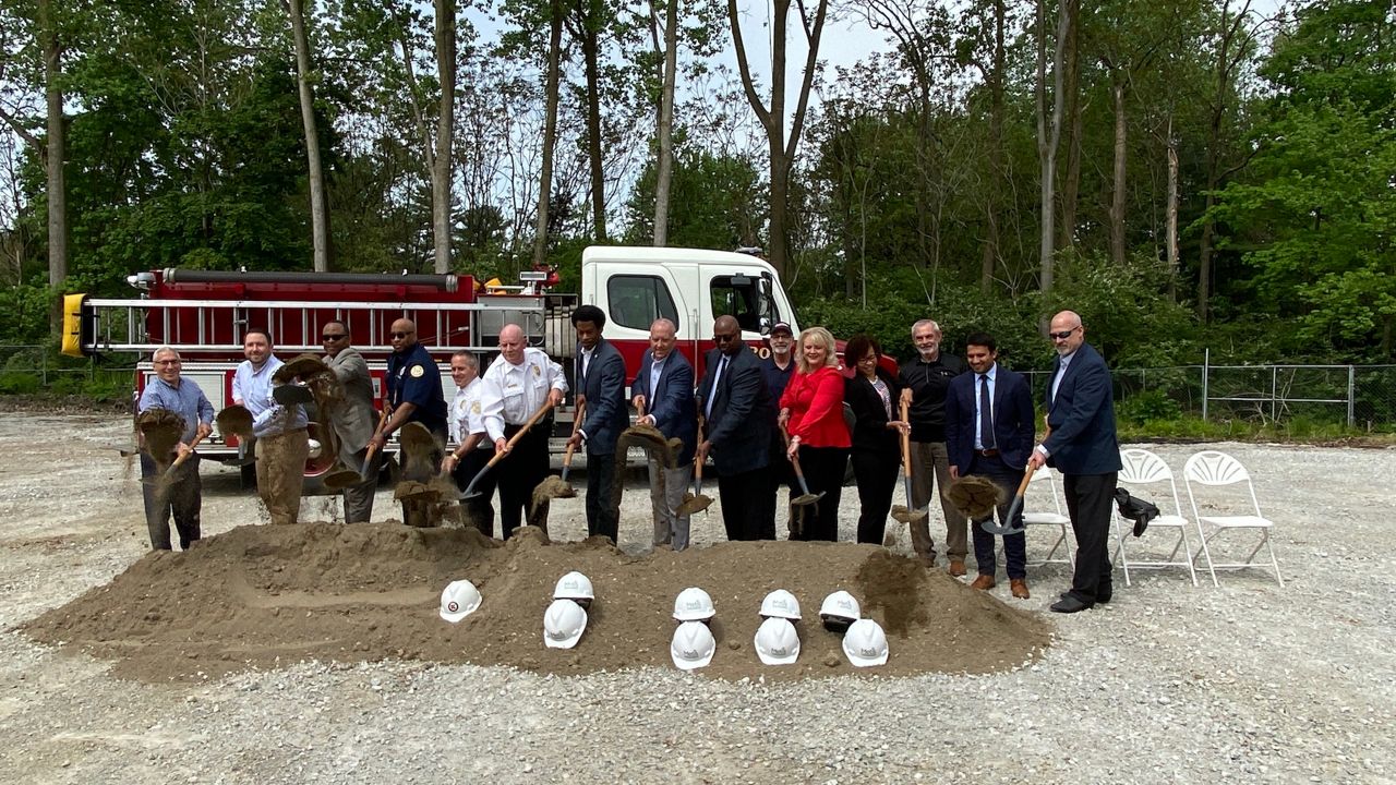 Breaking ground for Fire Station No. 12 (left to right) Ward 2 Councilman Phil Lombardo, Kenmore Project Manager Kyle Monda, Deputy Service Director Eufrancia Lash, Fire Lt. Mike Brooks, Fire Deputy Chief Richard Vober, Fire Chief Joseph Natko, Ward 4 Councilman Russel C. Neal Jr., Mayor Dan Horrigan, Deputy Mayor for Public Safety Clarence Tucker, At Large Councilman and Vice President of Council Jeff Fusco, Metis Construction Services President Julie Brandle, Ward 5 CouncilwomanTara Mosley, Ward 6 Councilman Brad McKitrick, Ward 8 Councilman Shammas Malik, Metis Construction Services Project Manager Edward Domer. (Spectrum News/Jennfer Conn)