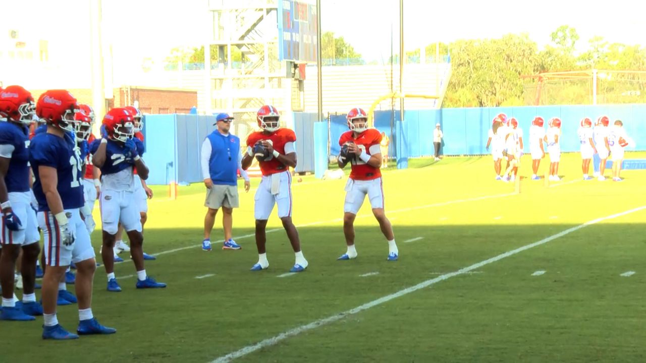 Florida Gators open padded practices with quarterback battle in focus