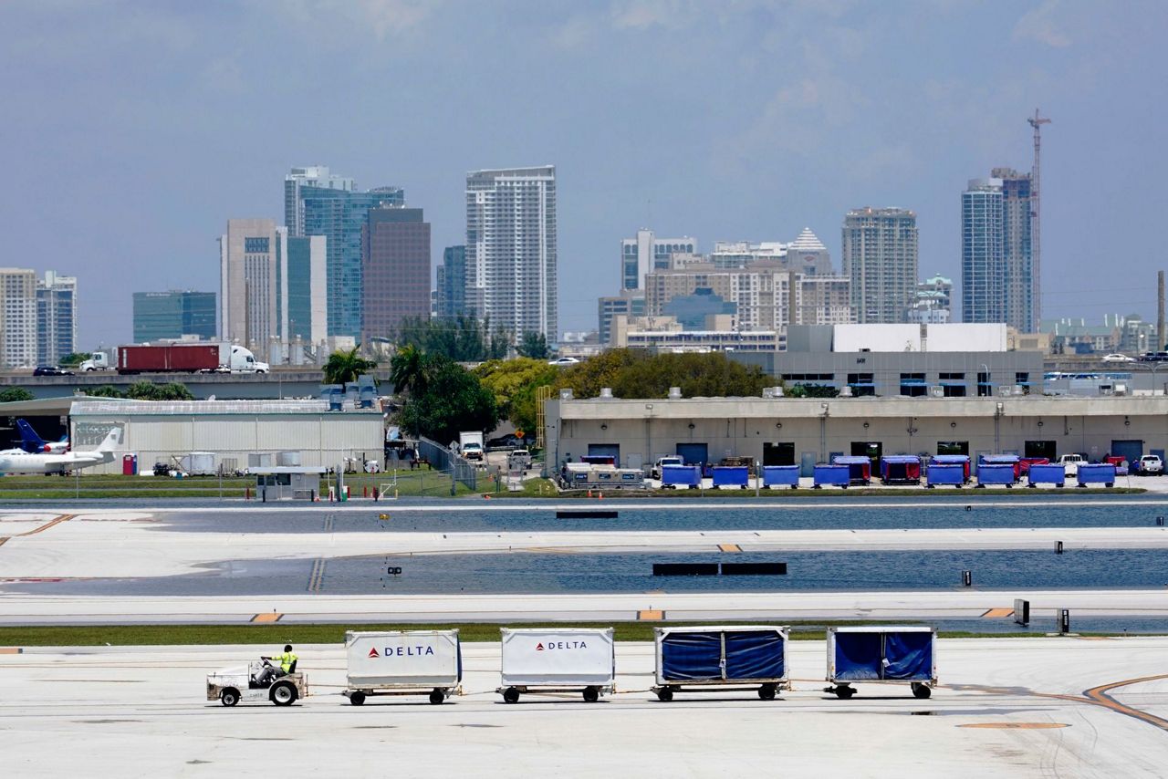 Airport looks to open as South Florida floods slowly recede