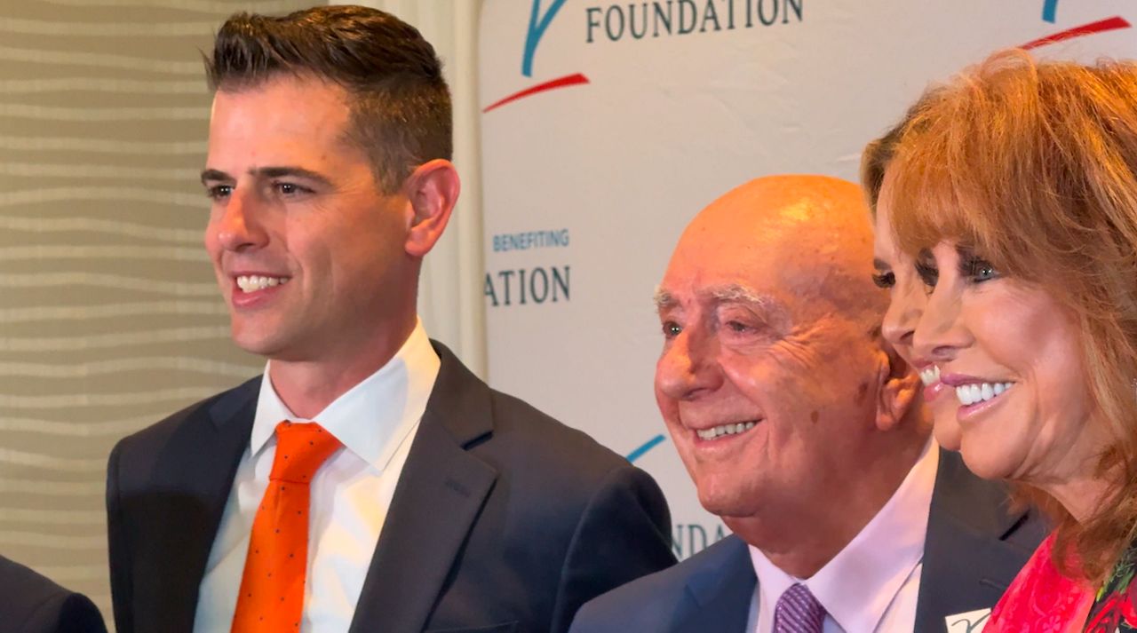 Florida Gators men's basketball head coach Todd Golden (left) attended his first Dick Vitale Gala after his team secured its third national championship title. (Spectrum Sports 360/Katherine Smith)