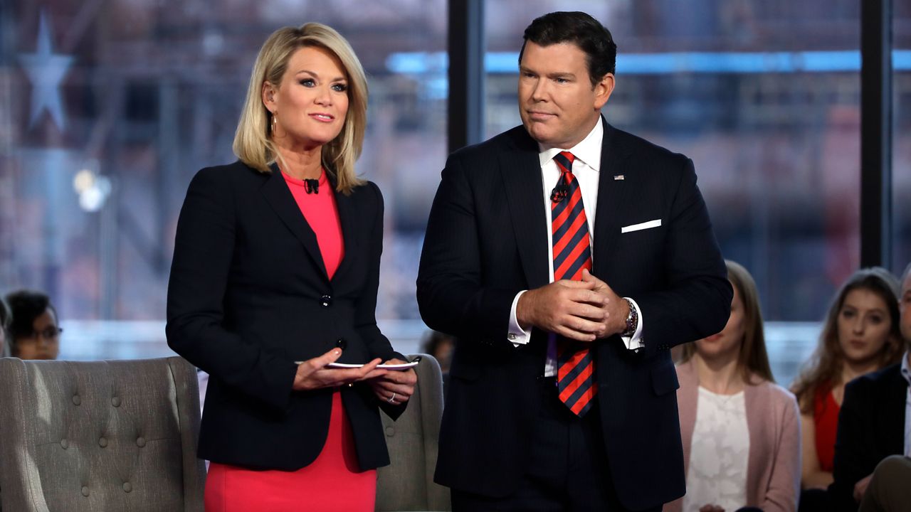 Bret Baier, right, and Martha MacCallum, left, stand during a Fox News town-hall style event with Sen. Bernie Sanders on April 15, 2019 in Bethlehem, Pa. The first 2024 Republican presidential debate on Wednesday, Aug. 23, 2023, is being moderated by Fox News hosts Bret Baier and Martha MacCallum. (AP Photo/Matt Rourke, File)