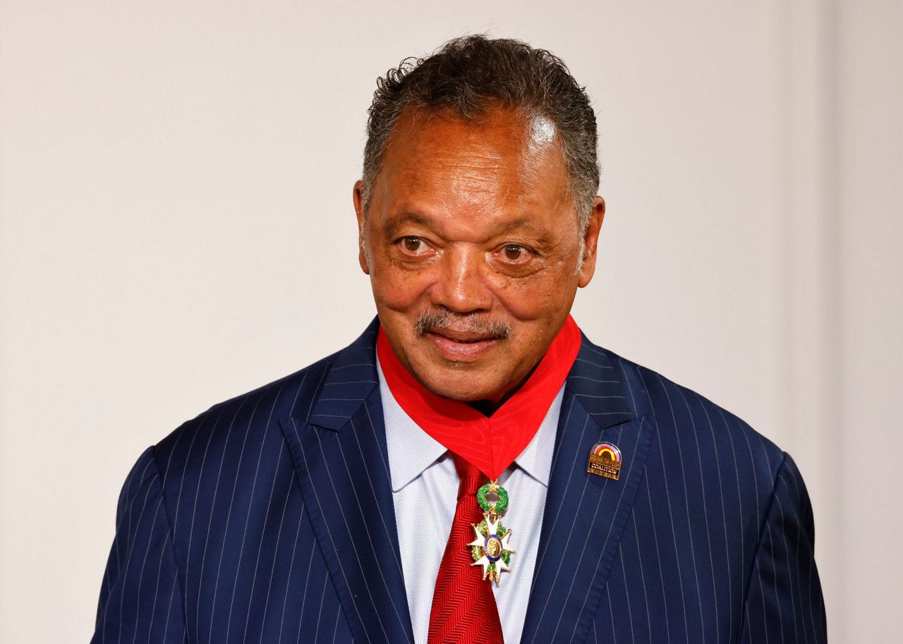 French president honors US civil rights leader Jesse Jackson