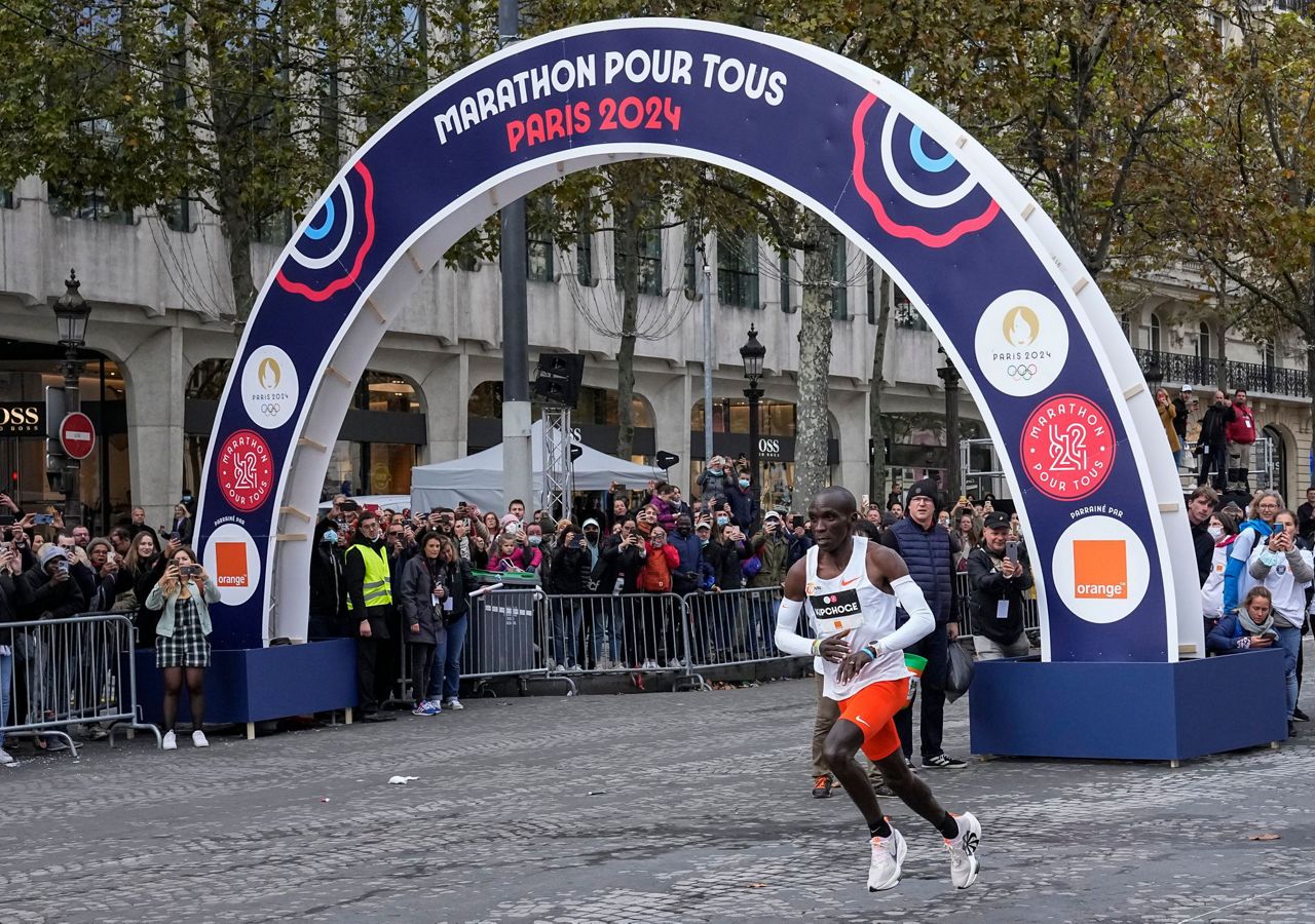 Paris runners race Olympic marathon champion Kipchoge