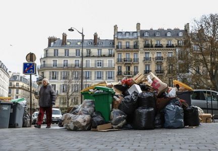 https://s7d2.scene7.com/is/image/TWCNews/France_Pensions_The_Garbage_Problem_04357?hei=300