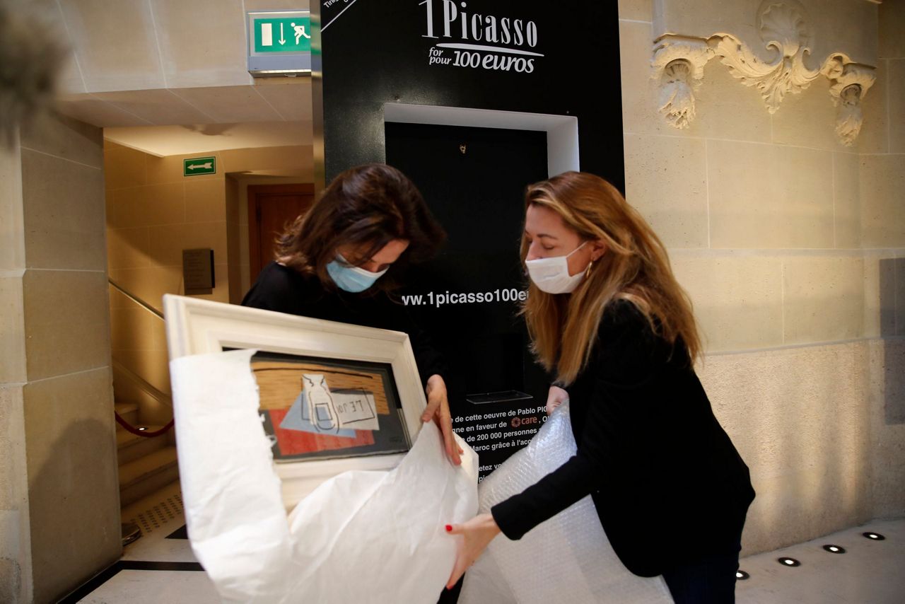 Woman in Italy wins 1-million-euro Picasso in charity raffle