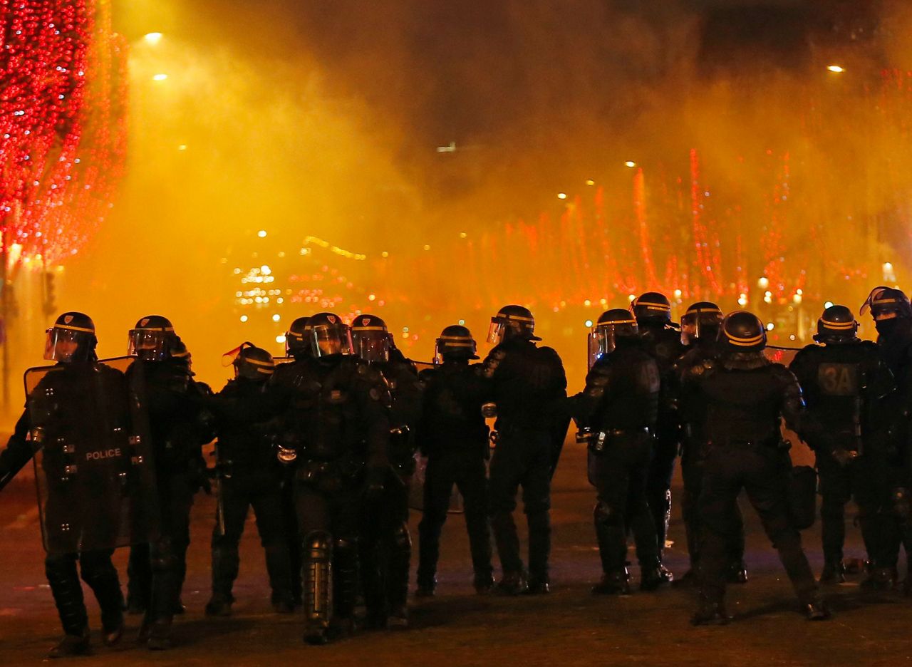 Suspect in attack on riot police held in France