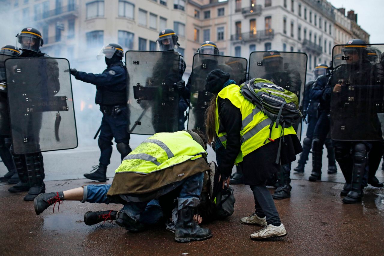 The Latest: France detains 1,220 after anti-govt protests