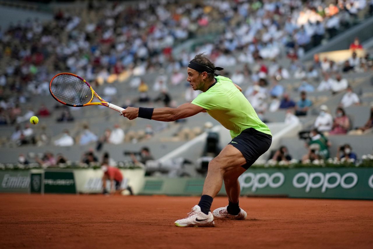 The Latest: Krejcikova aiming for titles sweep in Paris