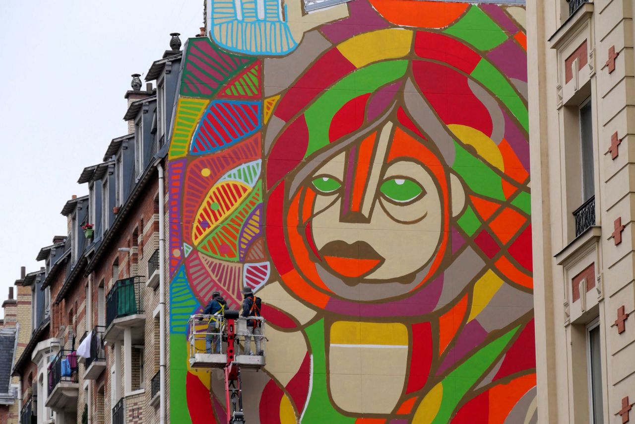 American French Artists Revive Hope On Giant Paris Mural   France US Street Art 64196