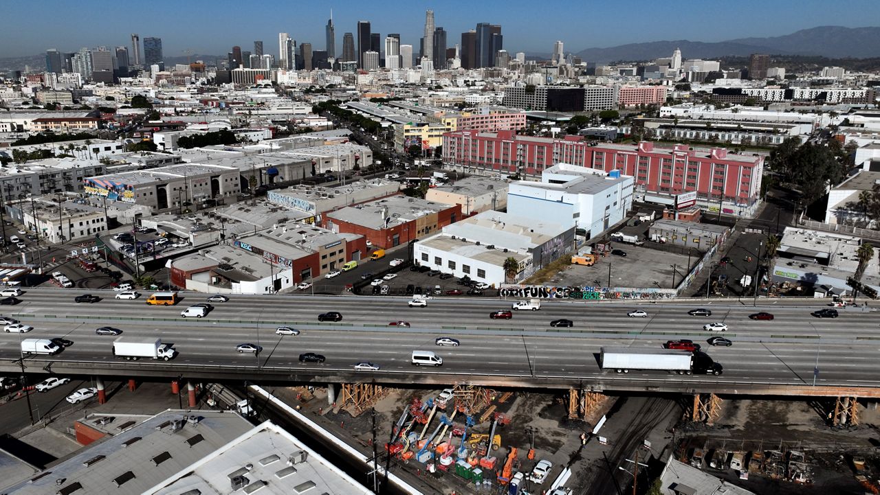 Traffic moves through the section of Interstate 10 Monday, Nov. 20, 2023. (AP Photo/Jae C. Hong)