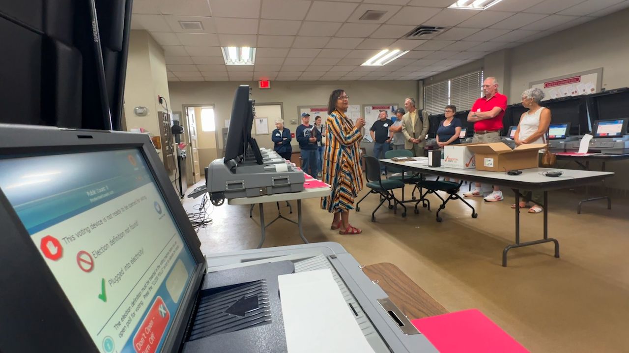 Election staff test voting machines ahead of primary