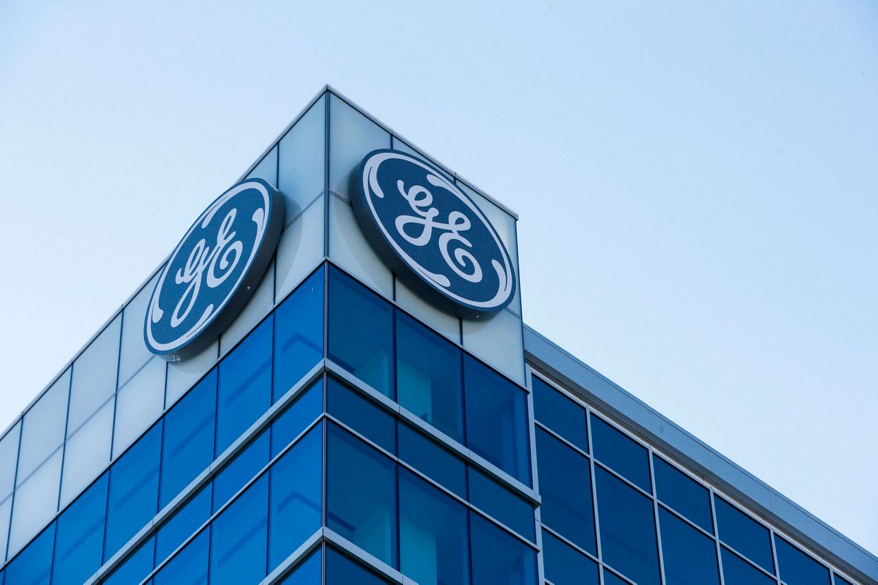 GE, seeking path through its 3rd century, ousts CEO
