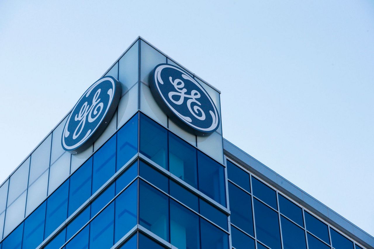 GE, seeking path through its 3rd century, ousts CEO