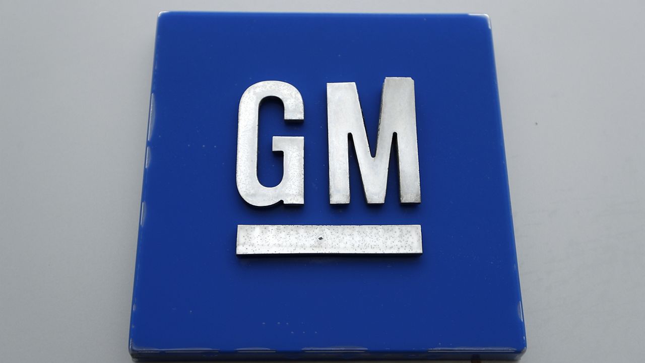 A General Motors logo is displayed outside the General Motors Detroit-Hamtramck Assembly plant on Jan. 27, 2020, in Hamtramck, Mich. (AP Photo/Paul Sancya, File) 