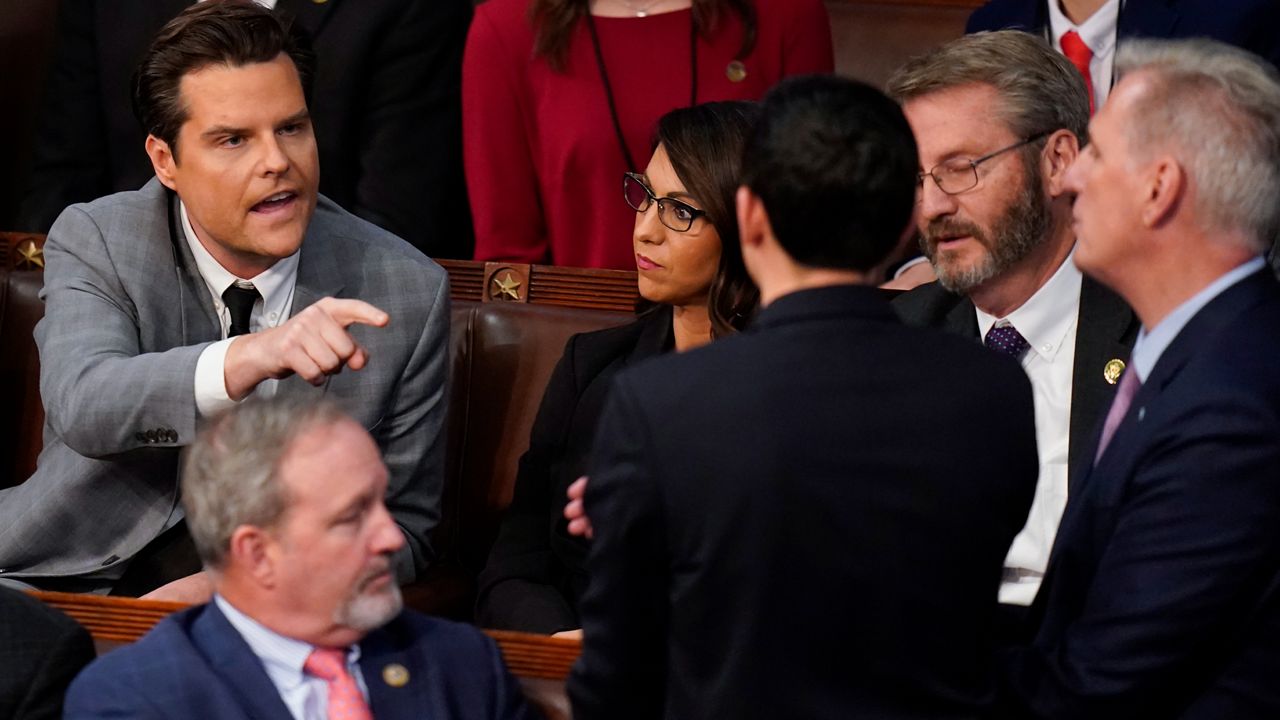 Rep. Matt Gaetz, R-Fla., left, talks to Rep. Kevin McCarthy, R-Calif., right, in the House chamber as the House meets for the fourth day to elect a speaker and convene the 118th Congress in Washington on Jan. 6, 2023. (AP Photo/Alex Brandon, File)