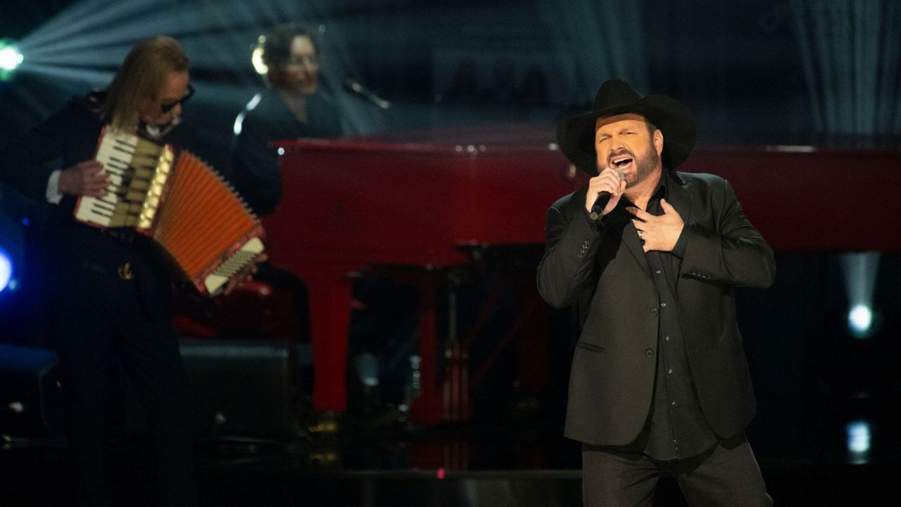 Garth Brooks performs at the 2024 Library of Congress Gershwin Prize for Popular Song tribute concert honoring Elton John and Bernie Taupin at DAR Constitution Hall on Wednesday, March 20, 2024, in Washington. (AP Photo/Kevin Wolf)