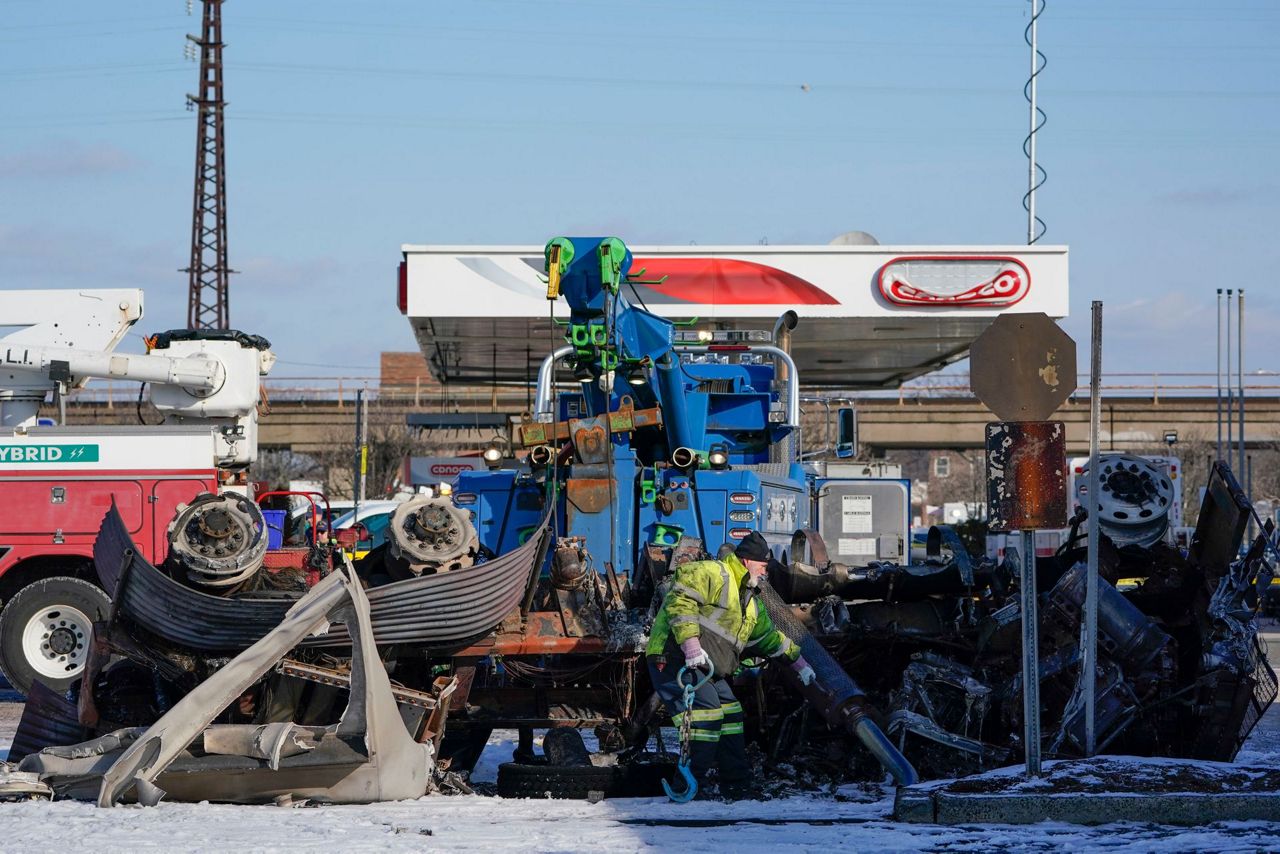 Gasoline tanker crashes into building, bursts into fireball