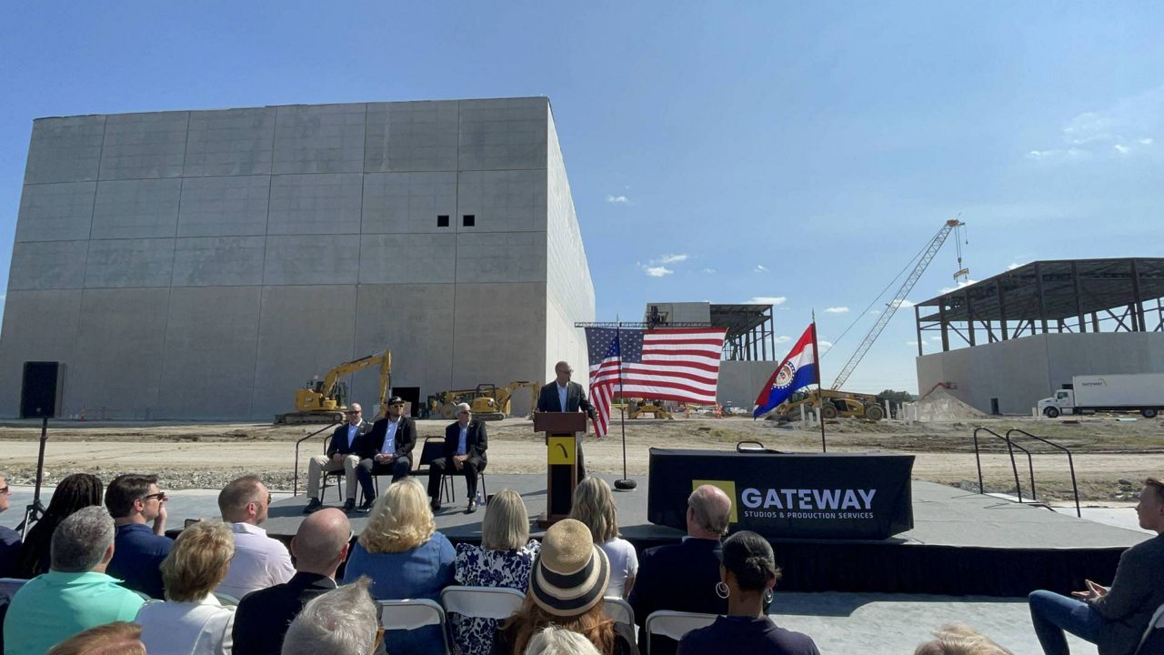 State Sen. Denny Hoskins, sponsor of a new law that reinstates a tax credit for entertainment projects shot in the state and for musical acts that rehearse in the state ahead of concert tours, talks to a crowd at a ceremonial bill signing event in Chesterfield. (Spectrum News/Gregg Palermo)