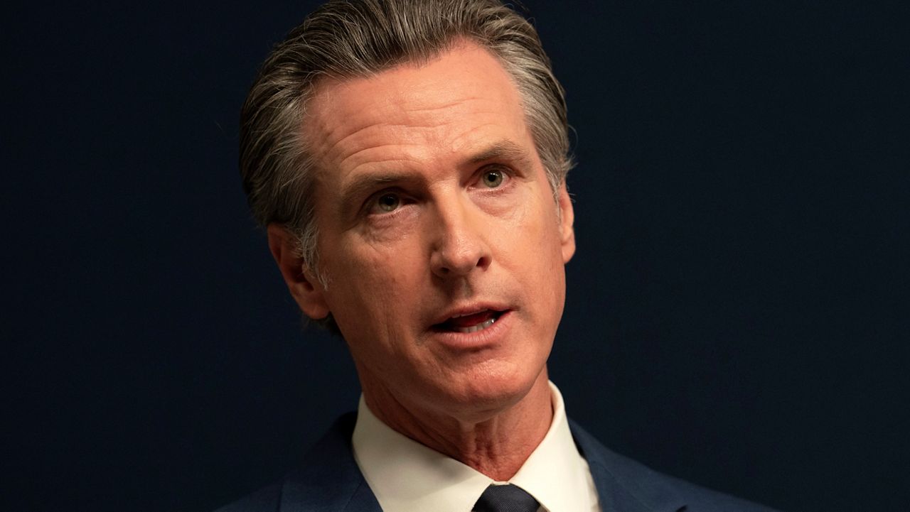 California Gov. Gavin Newsom answers questions after he signed three gun control measures during a news conference in Sacramento, Calif., Tuesday Sept, 26, 2023, (AP Photo/Rich Pedroncelli)