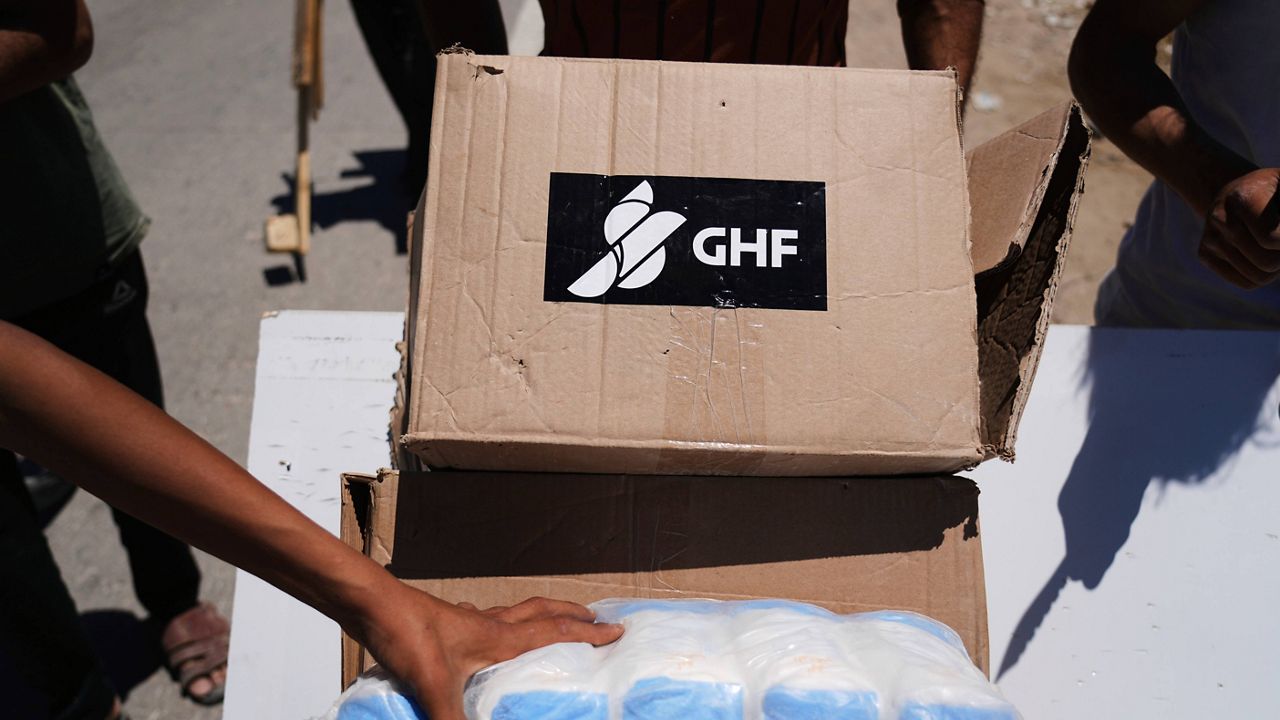 Boxes and bags of humanitarian aid delivered by the Gaza Humanitarian Foundation, a U.S.-backed organization approved by Israel, are seen in Khan Younis, southern Gaza Strip, on May 29, 2025. (AP Photo/Abdel Kareem Hana, File)