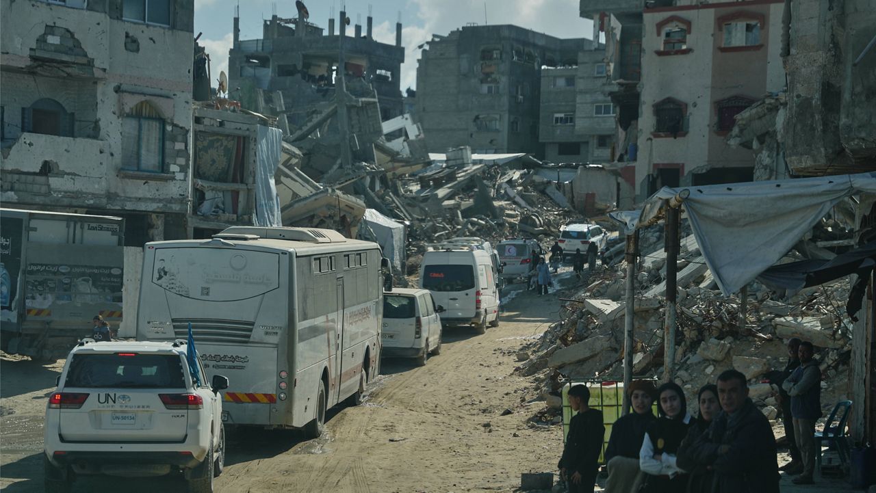 Israel strikes Gaza, killing 21, after saying Hamas violated deal