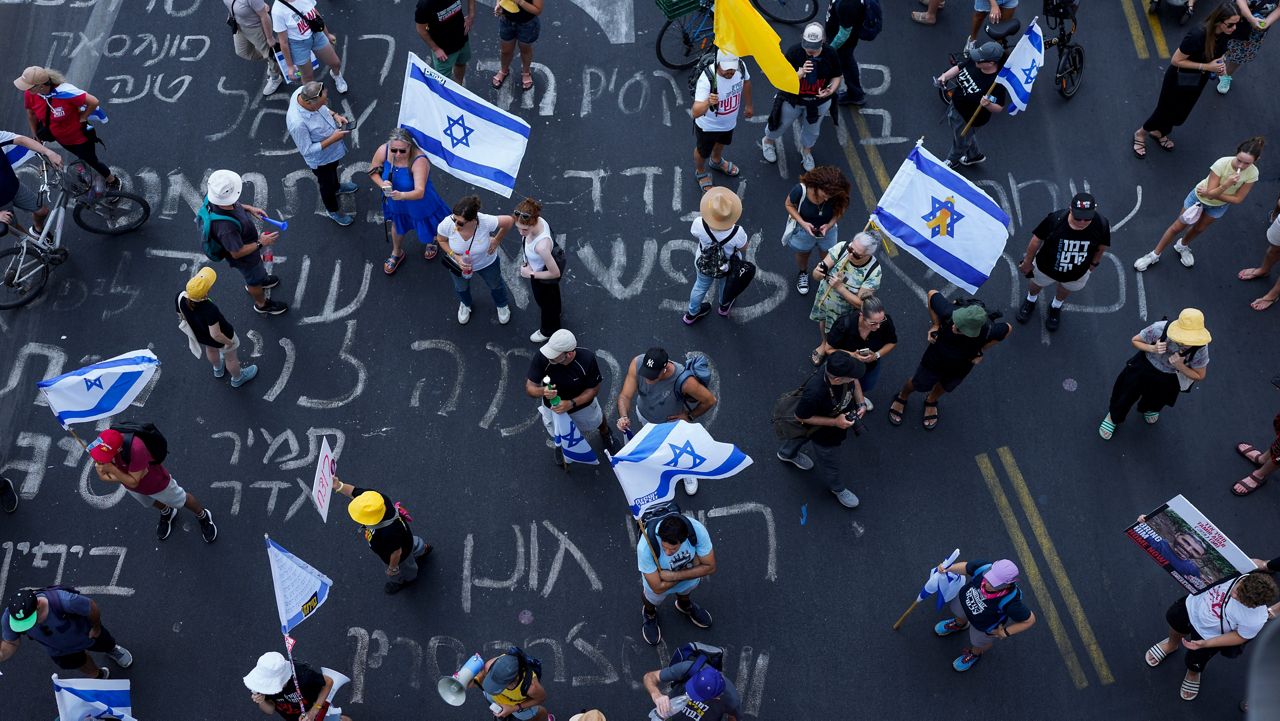 Demonstrators demanded a cease-fire deal and the immediate release of hostages held by Hamas in the Gaza Strip after the deaths of six hostages in the Palestinian territory, in Tel Aviv, Israel, on Monday, Sept. 2, 2024. (AP Photo/Ohad Zwigenberg)