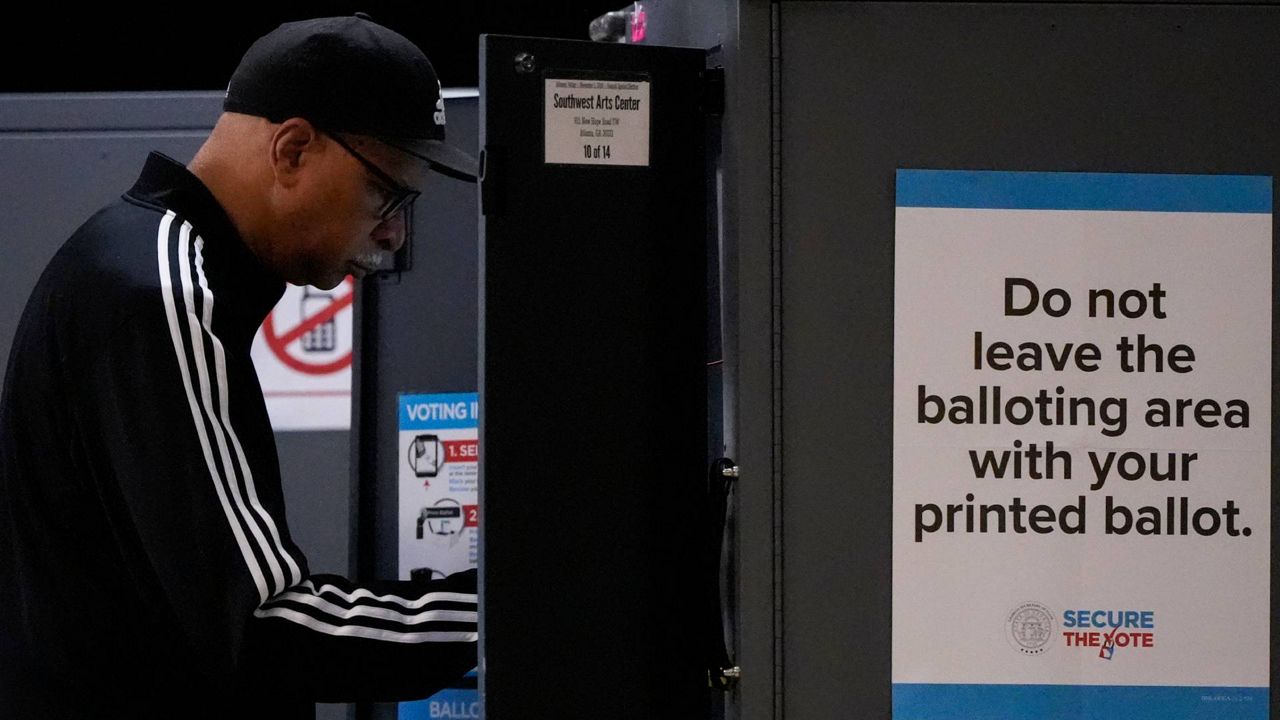 Early voting surges ahead of midterms, with records falling in many states
