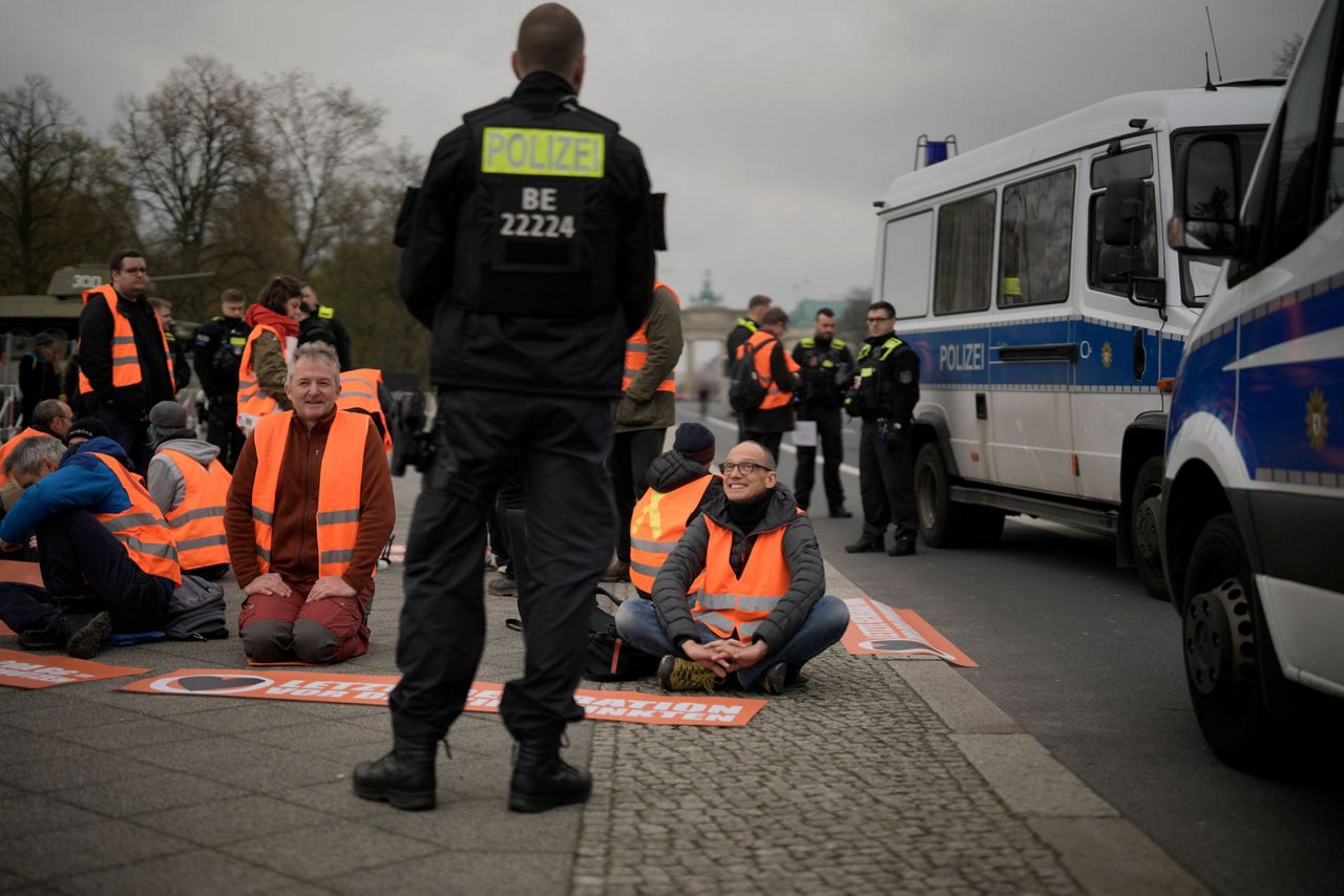 Climate activists stage slow march through German capital