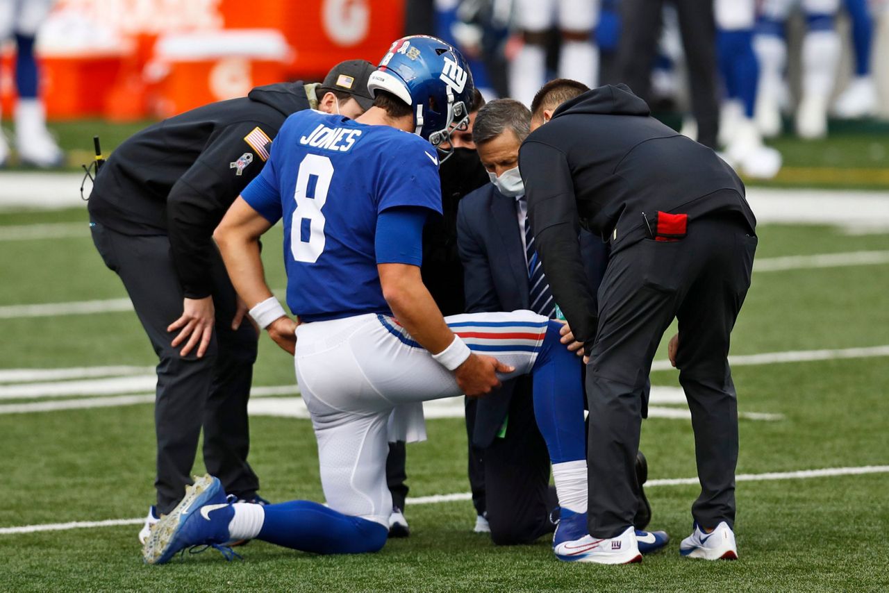 Giants QB Jones, Panthers WR Moore depart with injuries