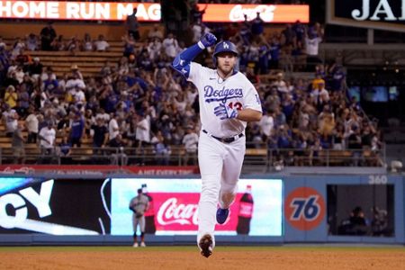 San Francisco Giants starting pitcher John Brebbia throws to the plate  during the first inning of a baseball game against the Los Angeles Dodgers  Tuesday, Sept. 6, 2022, in Los Angeles. (AP