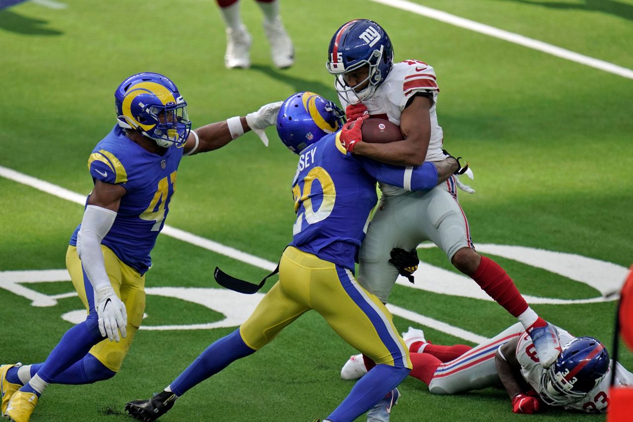 Rams hold off Giants 17-9; Ramsey, Tate fight after game