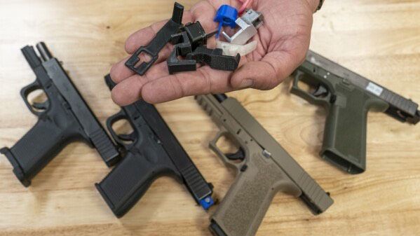 So-called Glock switches are prohibited under federal law.  (Associated Press, file)