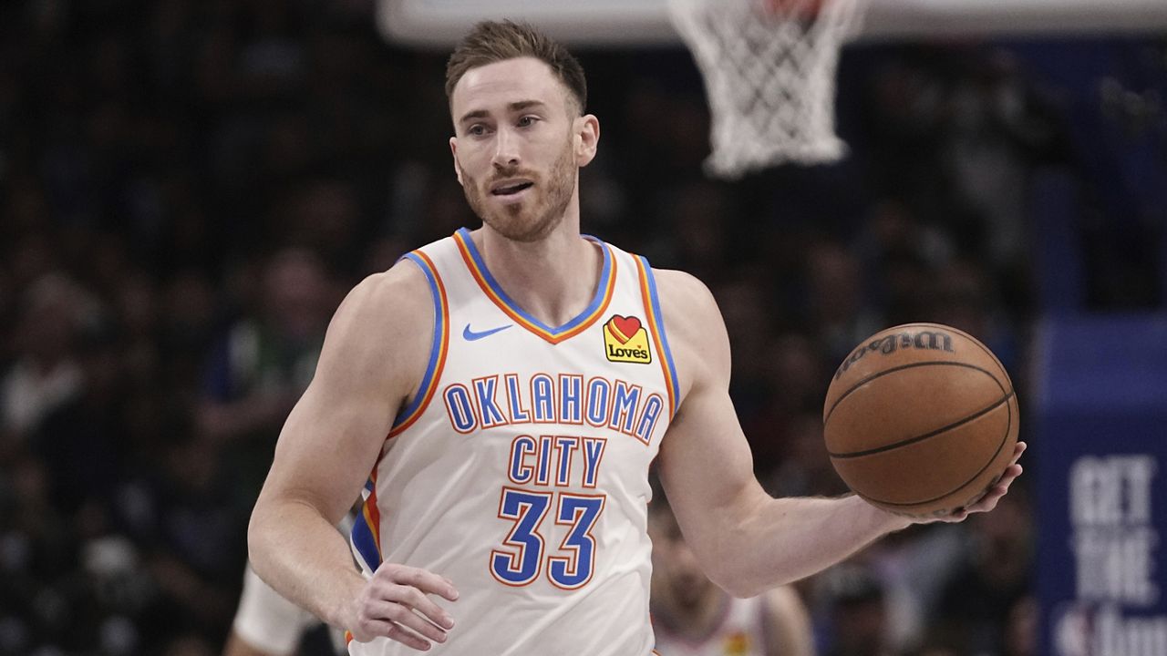 FILE - Oklahoma City Thunder's Gordon Hayward handles the ball in Game 3 of an NBA basketball second-round playoff series against the Dallas Mavericks, on May 11, 2024, in Dallas. Hayward, who nearly gave Butler a national title over Duke with a half-court shot that just missed on the final play of the 2010 NCAA men’s basketball championship game, retired from the NBA after 14 seasons on Thursday, Aug. 1, 2024. (AP Photo/Tony Gutierrez)