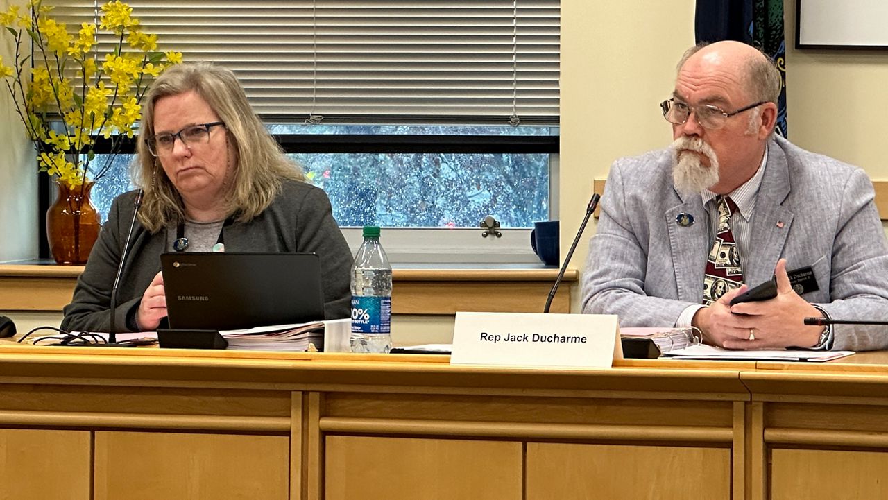 Rep. Anne Graham (D-North Yarmouth) and Rep. Jack Ducharme (R-Madison) listen to information about the state's tobacco settlement funds Monday during a meeting at the Cross State Office Building in Augusta. (Spectrum News/Susan Cover)