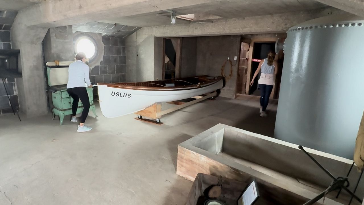 A rescue rowboat inside the Grand Haven South Pierhead Lighthouse in this image from June 25, 2026. (Spectrum News/Brain Farber)