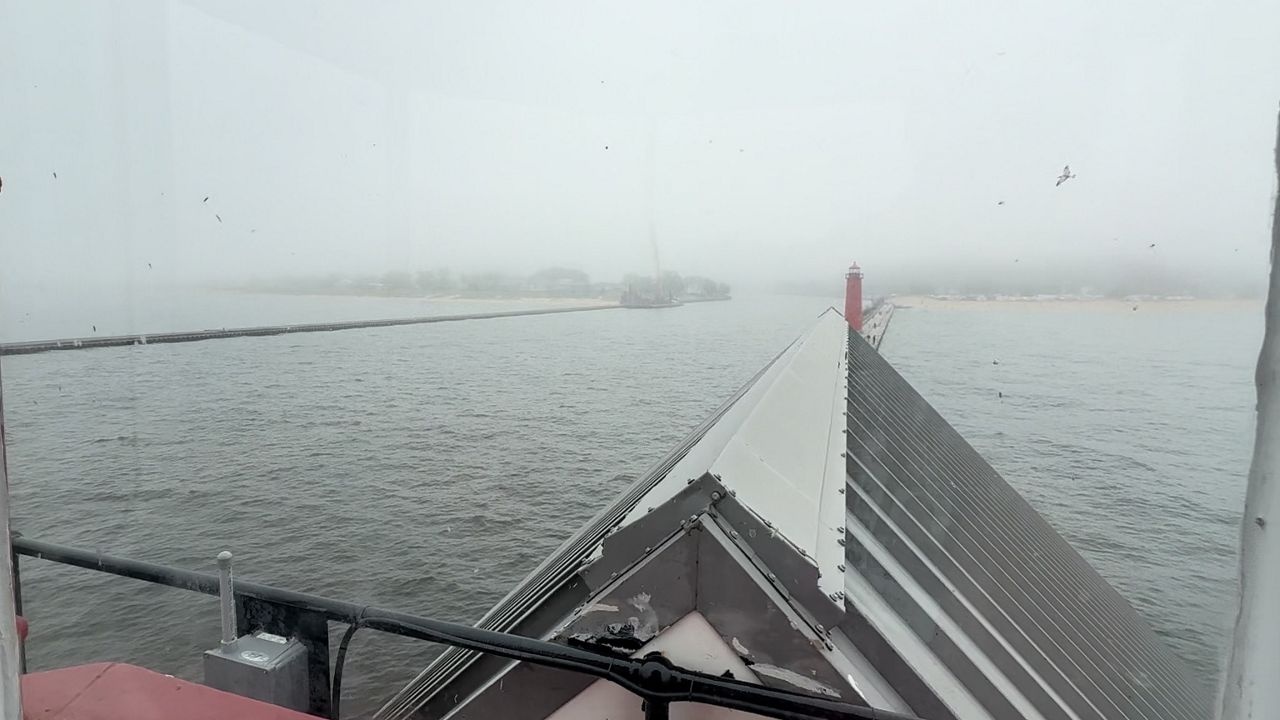 Fog is visible at Grand Haven South Pierhead Lighthouse in this image from June 25, 2026. (Spectrum News/Brain Farber)