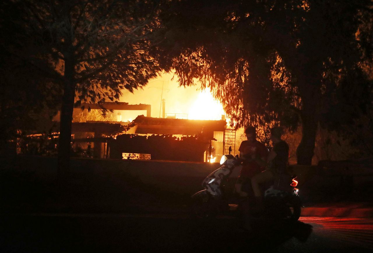 Residents flee forest fire near Greek capital of Athens
