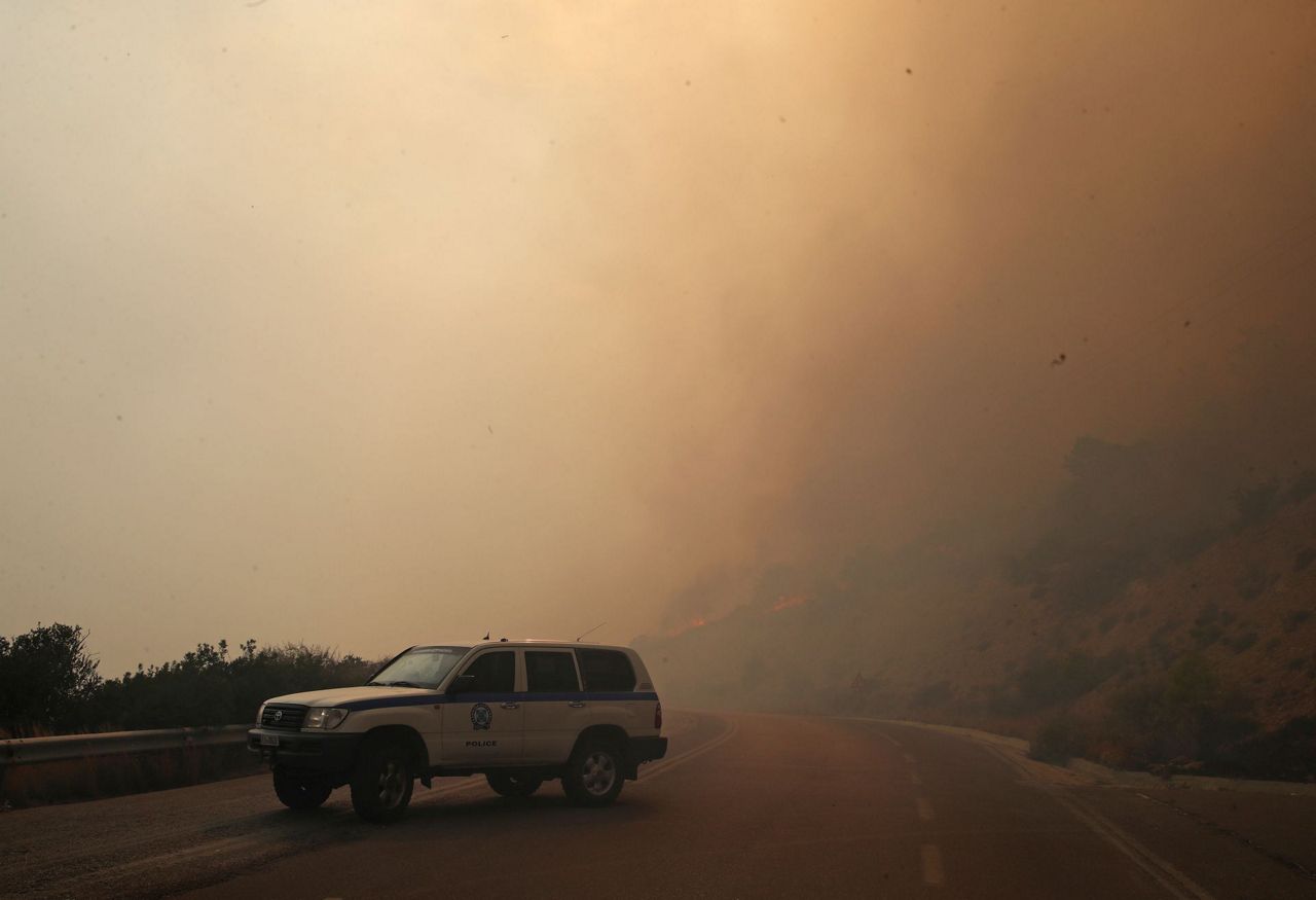 Residents flee forest fire near Greek capital of Athens