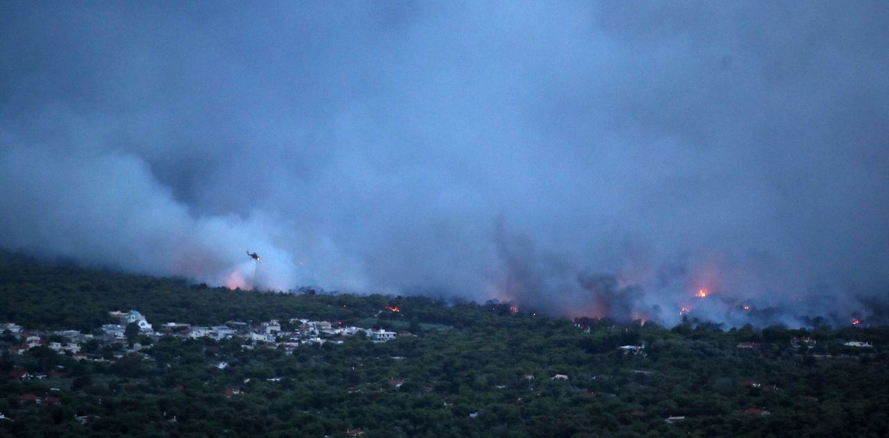 Residents flee forest fire near Greek capital of Athens