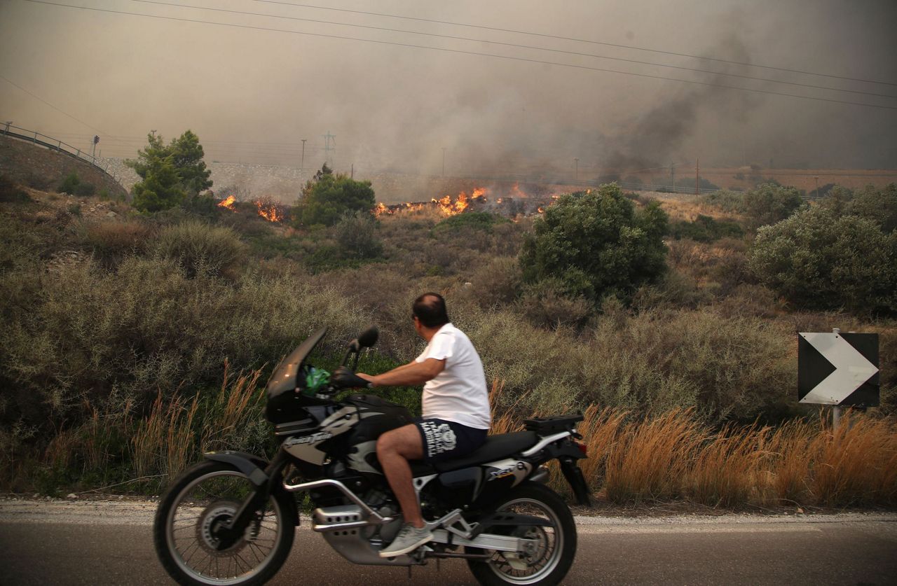 Residents flee forest fire near Greek capital of Athens