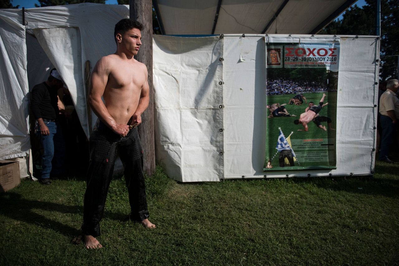 AP PHOTOS Oil wrestling practiced with devotion in Greece