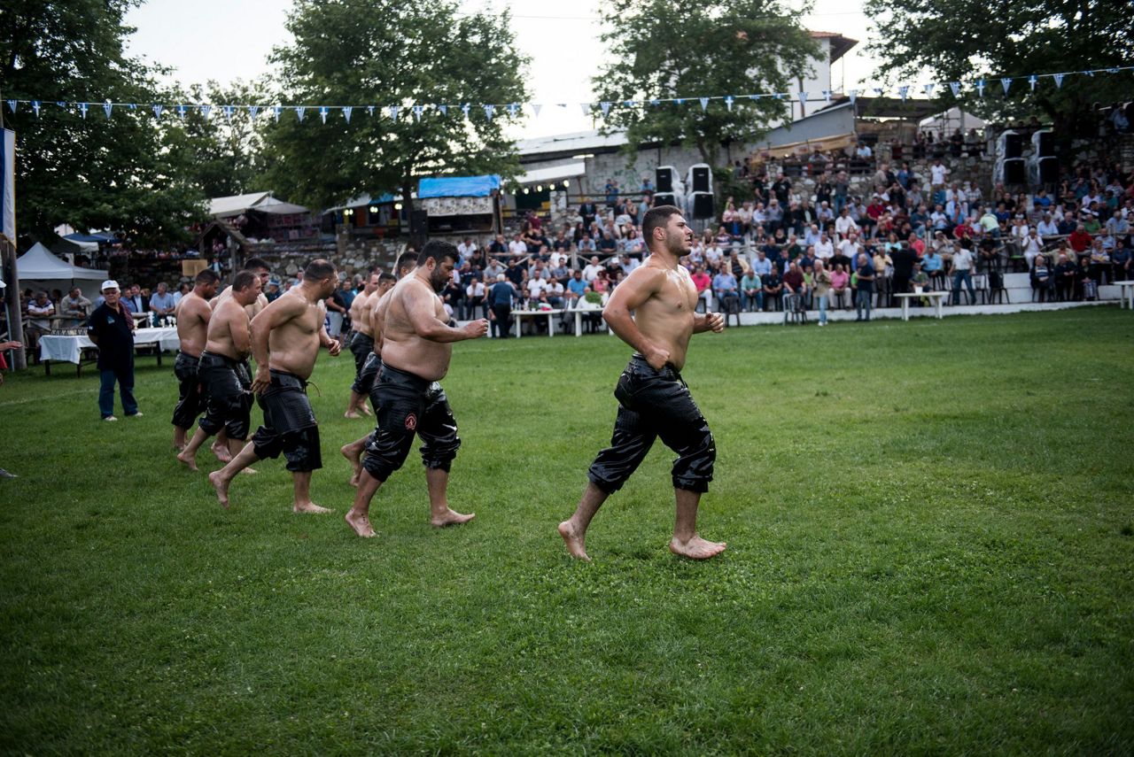 AP PHOTOS Oil wrestling practiced with devotion in Greece